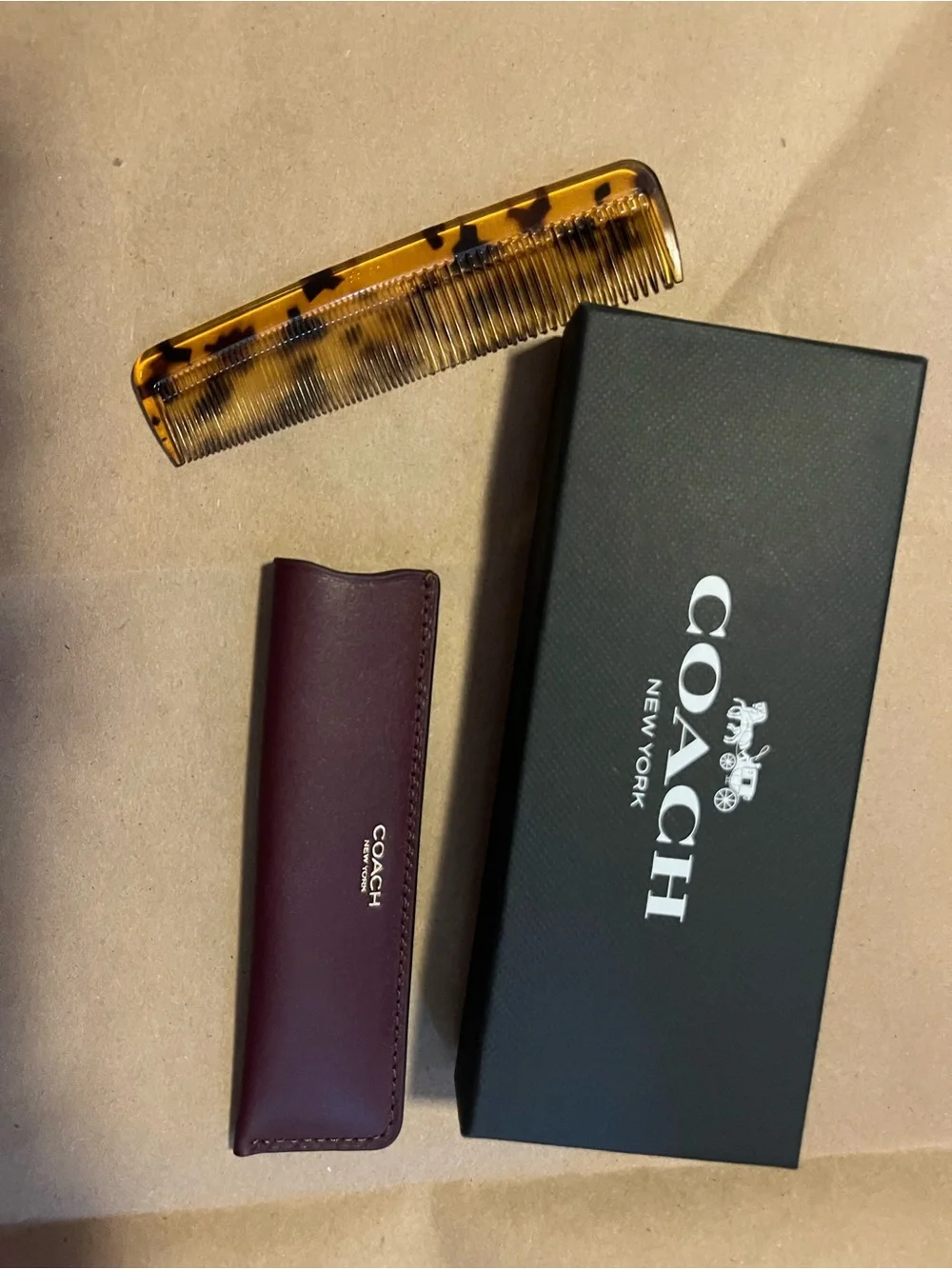 COACH Burgundy Leather Comb Sleeve with Tortoiseshell Comb